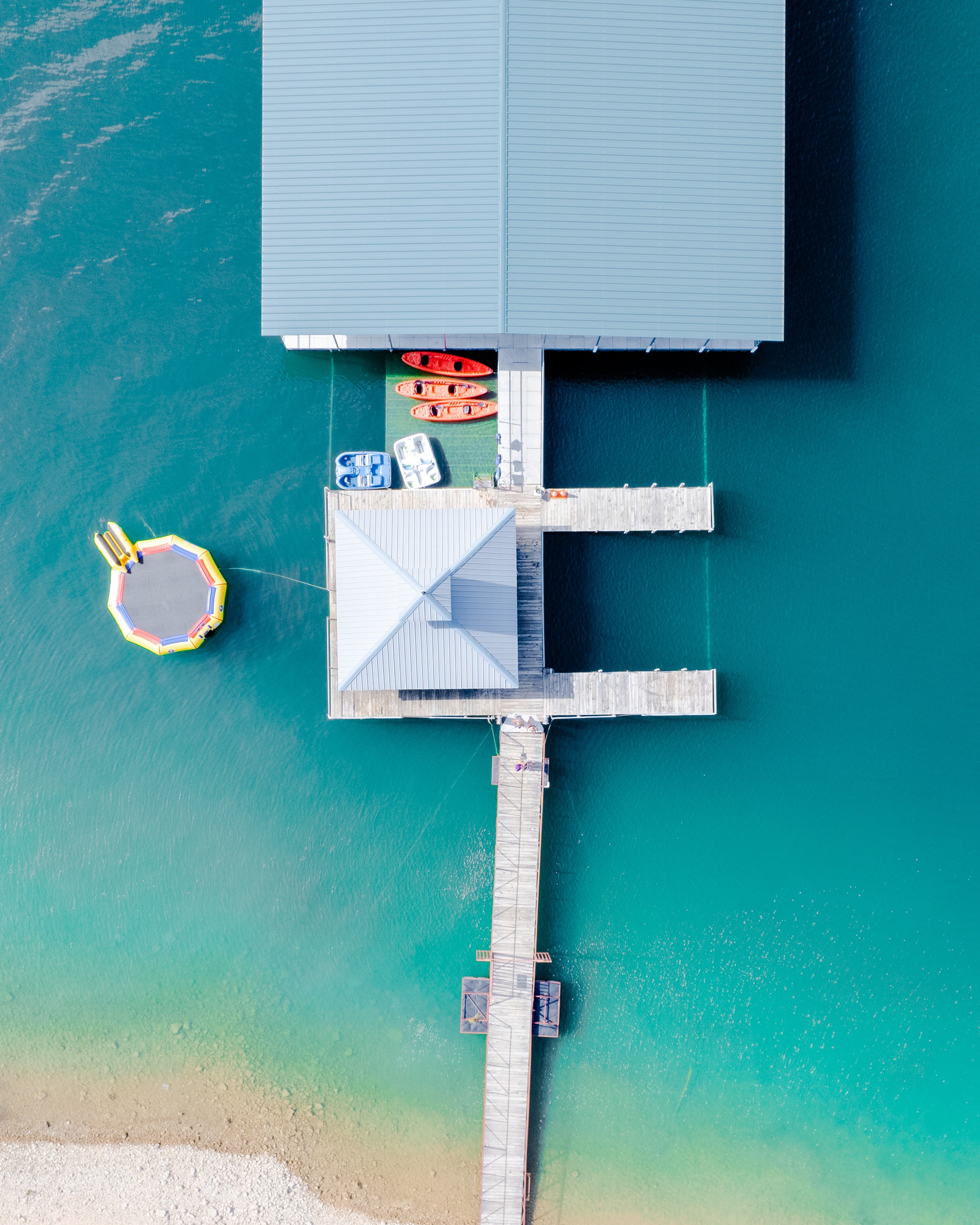 Aerial view of resort boat docks with kayaks
